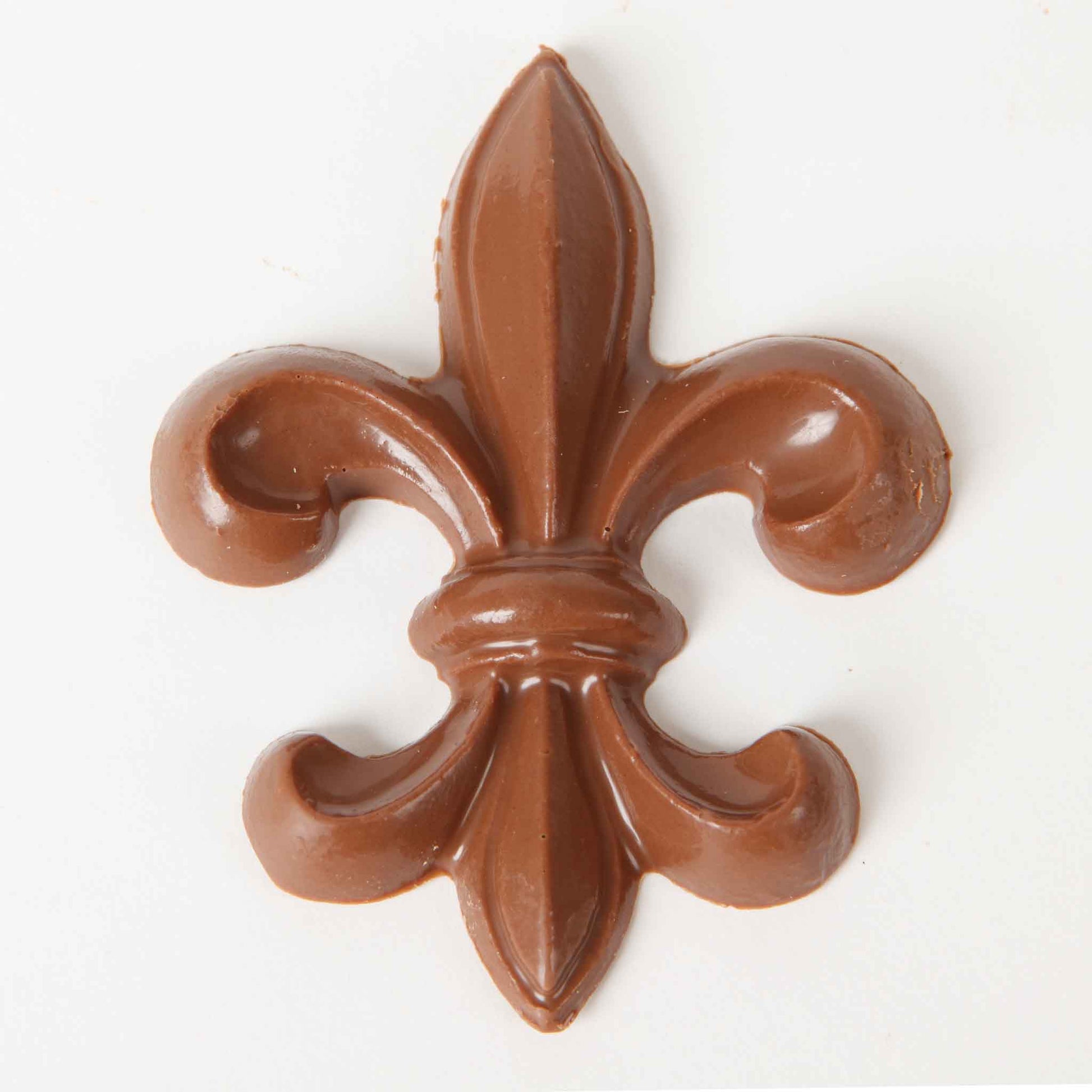 Muths Solid Chocolate Fleur de Lis Piece Closeup
